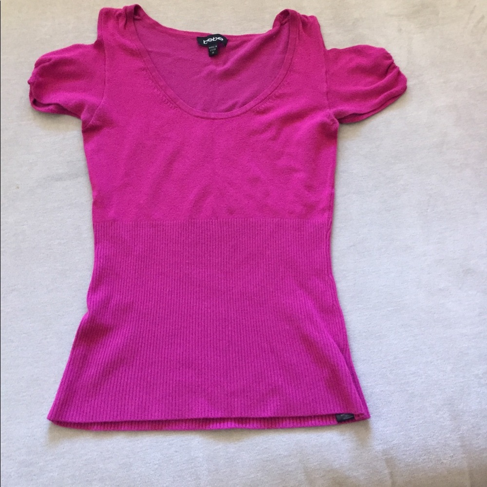 Bebe top with open shoulders.
